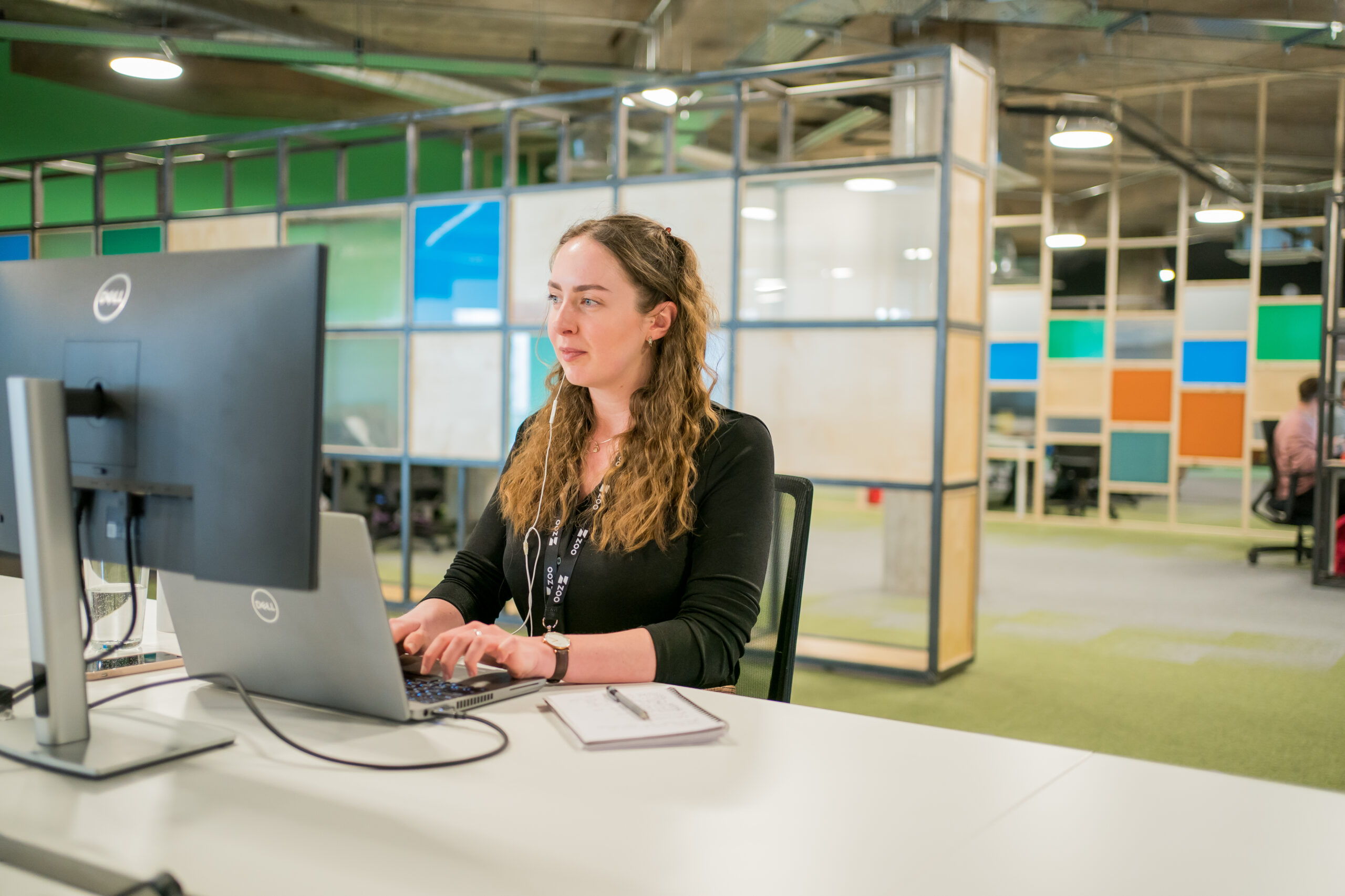 Zoo Digital employee working at desk